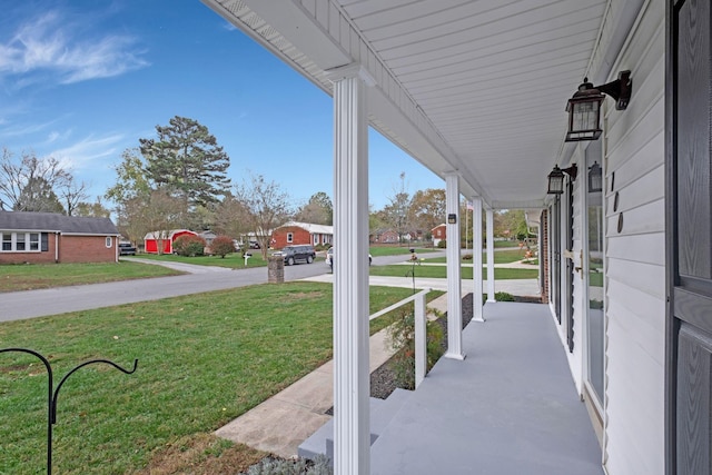 view of patio with a porch and a residential view