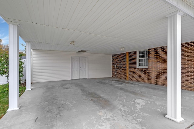 view of patio / terrace with an attached carport