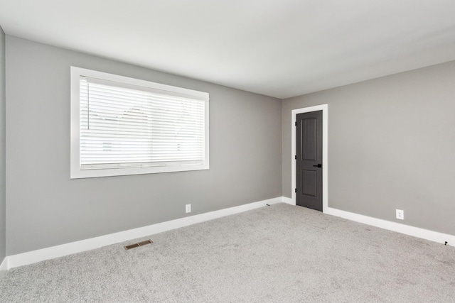 2129 Acklen Ave Unit 12, Nashville, TN 37212 - spare room with carpet flooring, baseboards, and visible vents