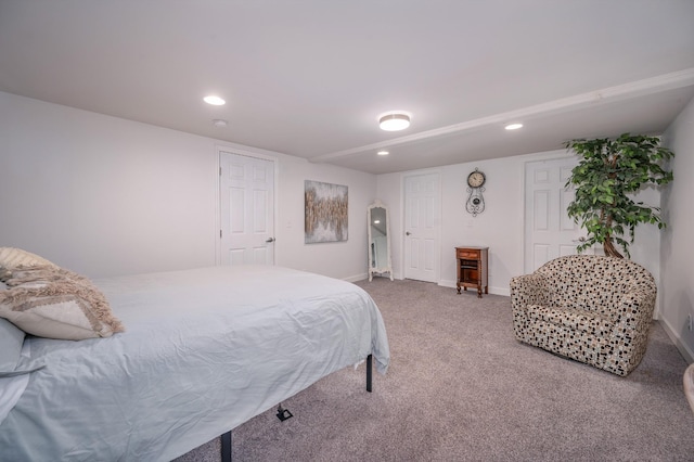 bedroom featuring recessed lighting, carpet flooring, and baseboards