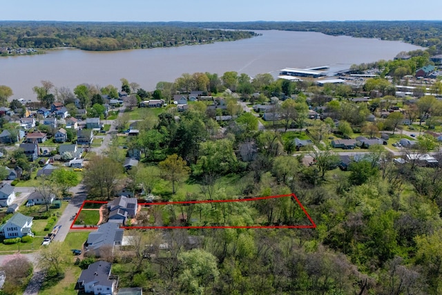 bird's eye view with a residential view and a water view