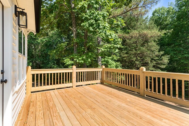 6149 Dewey Carr Rd, Bethpage, TN 37022 - wooden terrace featuring view of wooded area