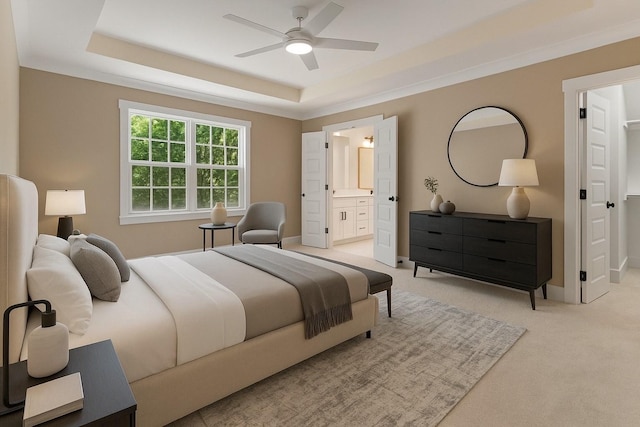 6149 Dewey Carr Rd, Bethpage, TN 37022 - bedroom with light carpet, a tray ceiling, connected bathroom, and a ceiling fan