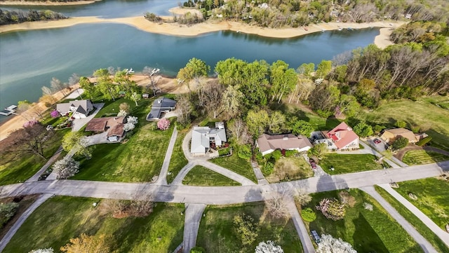 bird's eye view featuring a water view and a residential view