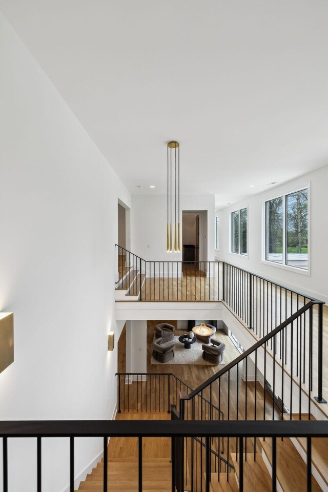 6004 Jocelyn Hollow Rd, Nashville, TN 37205 - staircase with baseboards and wood finished floors