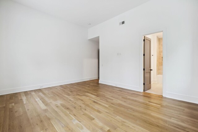 6004 Jocelyn Hollow Rd, Nashville, TN 37205 - empty room with visible vents, light wood-style flooring, and baseboards