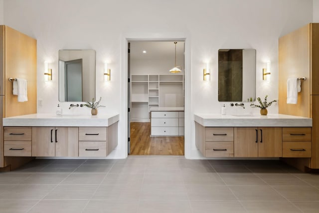 6004 Jocelyn Hollow Rd, Nashville, TN 37205 - bathroom featuring tile patterned floors, a sink, and two vanities