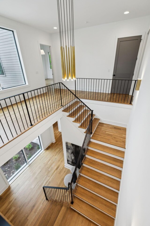6004 Jocelyn Hollow Rd, Nashville, TN 37205 - staircase featuring recessed lighting and wood finished floors