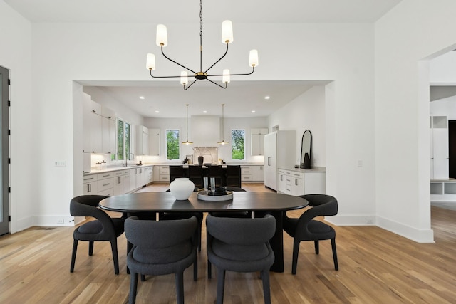 6004 Jocelyn Hollow Rd, Nashville, TN 37205 - dining space with recessed lighting, light wood-style floors, baseboards, and an inviting chandelier