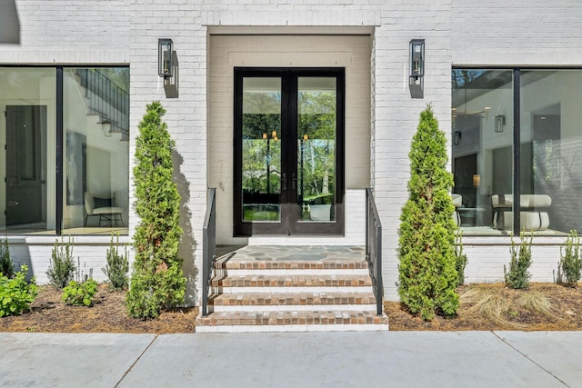 6004 Jocelyn Hollow Rd, Nashville, TN 37205 - doorway to property with brick siding and french doors
