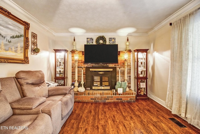 3115 Coon Hunter Lodge Rd, Jamestown, TN 38556 - living area featuring a fireplace, wood finished floors, ornamental molding, and decorative columns