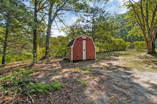 3115 Coon Hunter Lodge Rd, Jamestown, TN 38556 - view of shed with a wooded view