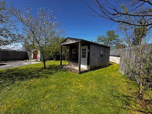 view of shed with a fenced backyard