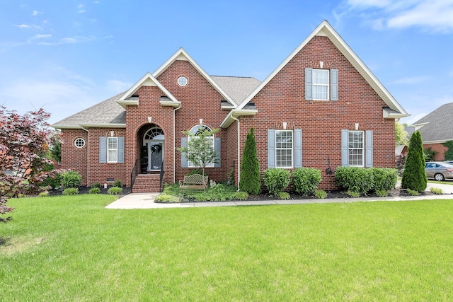 3307 Genoa Dr, Murfreesboro, TN 37128 - view of front facade featuring a front lawn, brick siding, and a shingled roof