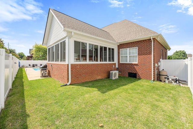 3307 Genoa Dr, Murfreesboro, TN 37128 - rear view of property featuring brick siding, roof with shingles, ac unit, and a sunroom