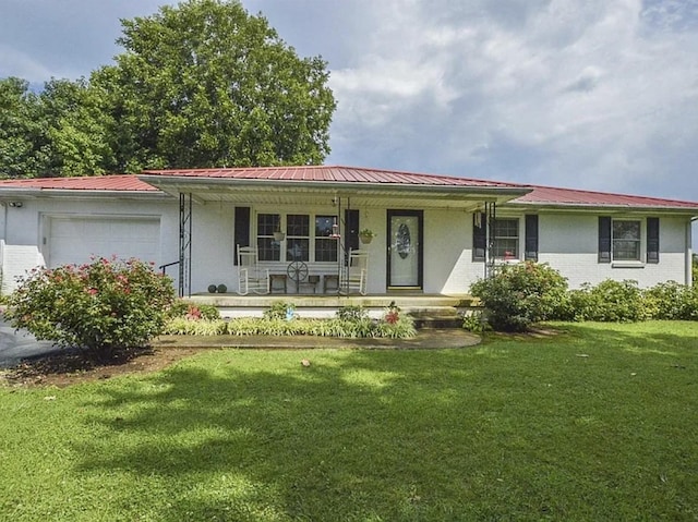 2901 Hurricane Creek Rd, Lawrenceburg, TN 38464 - ranch-style house featuring a porch, metal roof, a garage, brick siding, and a front yard