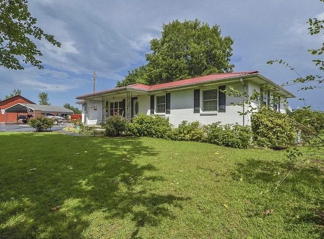 2901 Hurricane Creek Rd, Lawrenceburg, TN 38464 - single story home featuring a front lawn and brick siding