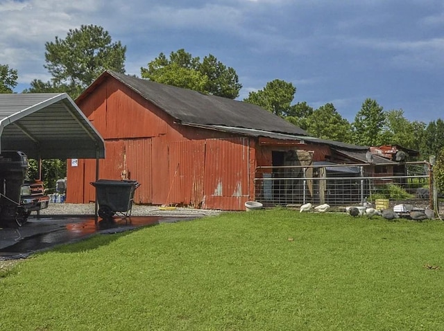 2901 Hurricane Creek Rd, Lawrenceburg, TN 38464 - view of outbuilding featuring a carport and an outdoor structure