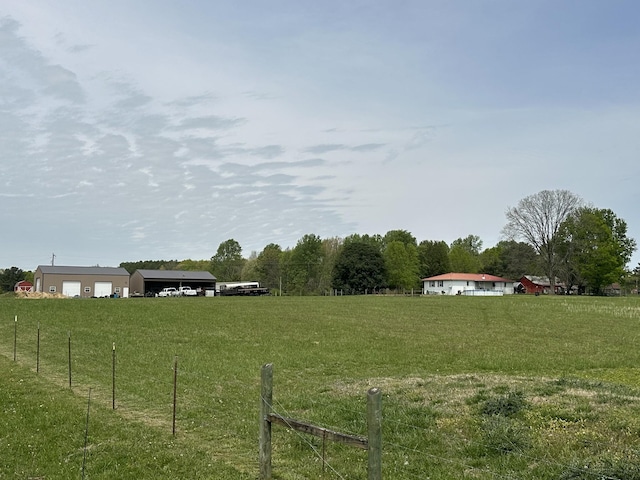 2901 Hurricane Creek Rd, Lawrenceburg, TN 38464 - view of yard with fence, a rural view, and a garage