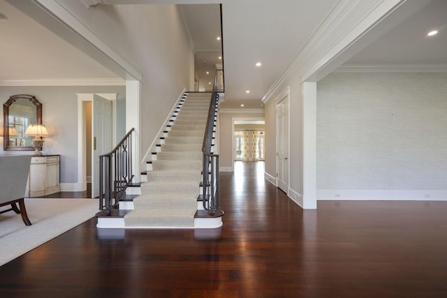 6021 Jocelyn Hollow Rd, Nashville, TN 37205 - entrance foyer featuring baseboards, ornamental molding, recessed lighting, wood finished floors, and stairs