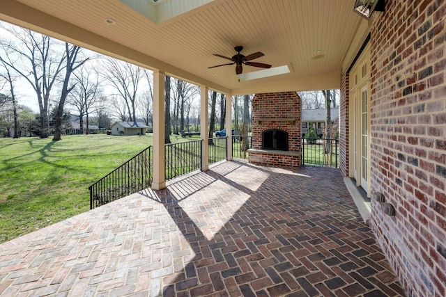 6021 Jocelyn Hollow Rd, Nashville, TN 37205 - view of patio with ceiling fan and an outdoor brick fireplace