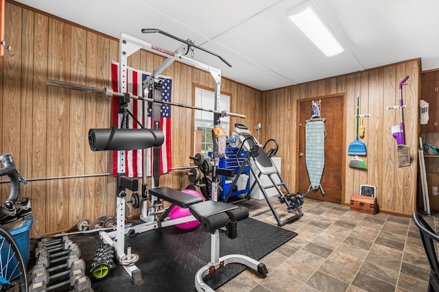 exercise area with wood walls