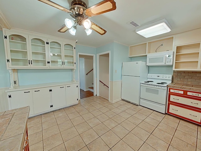 kitchen with light tile patterned floors, open shelves, light countertops, ceiling fan, and white appliances