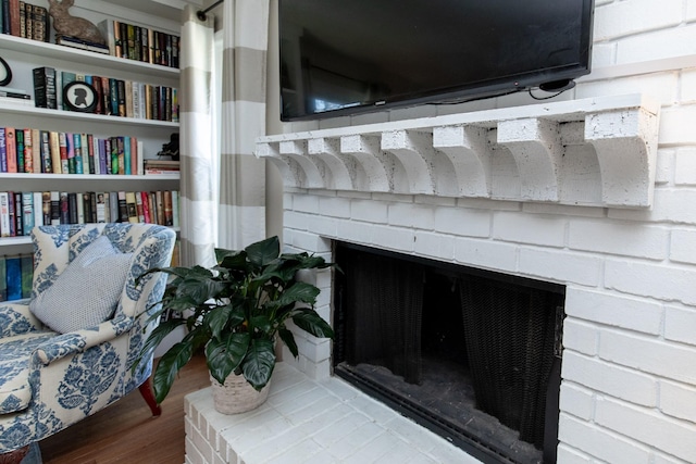 1411 Newmans Trl, Hendersonville, TN 37075 - detailed view of a brick fireplace and wood finished floors