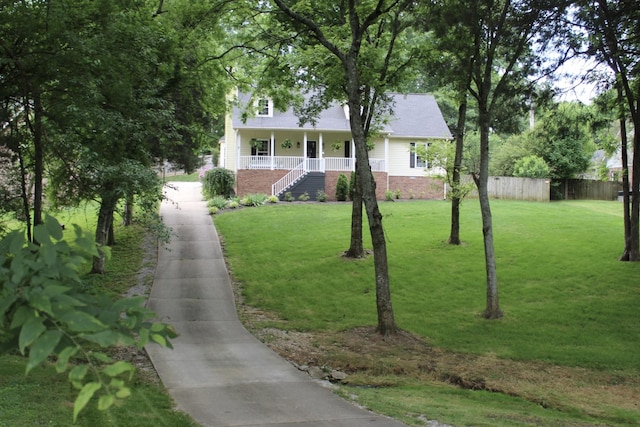 1411 Newmans Trl, Hendersonville, TN 37075 - view of front of property featuring covered porch, stairs, and concrete driveway