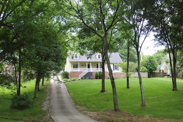 1411 Newmans Trl, Hendersonville, TN 37075 - view of front of home with a porch, stairs, concrete driveway, and brick siding