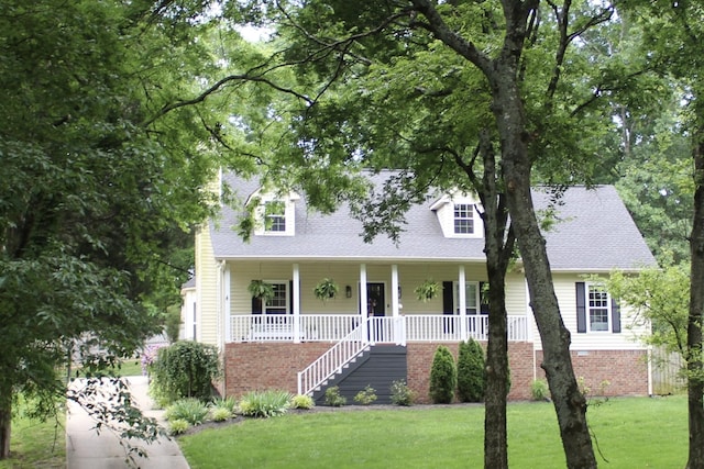 1411 Newmans Trl, Hendersonville, TN 37075 - cape cod home with a porch, a front yard, stairs, and a shingled roof