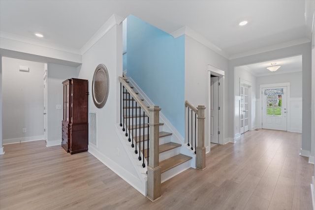 900 Easton Dr, Mount Juliet, TN 37122 - staircase with visible vents, baseboards, crown molding, and wood finished floors