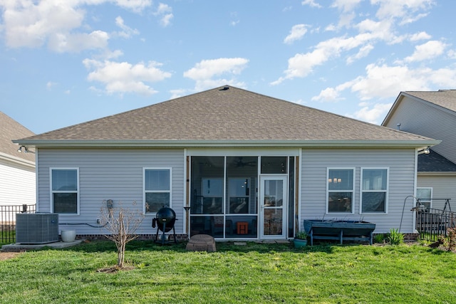 359 Mattieton Ln, Gallatin, TN 37066 - rear view of property featuring a sunroom, a hot tub, a yard, fence, and cooling unit