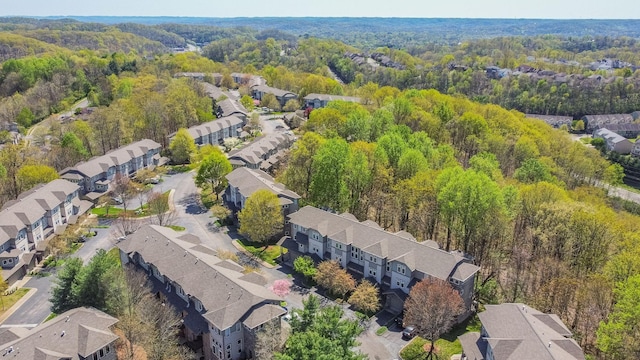aerial view with a residential view and a view of trees