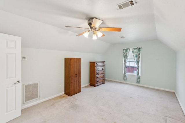 bonus room featuring visible vents, baseboards, a ceiling fan, and vaulted ceiling