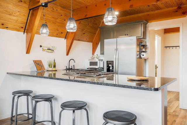 825 Hunters Landing Ln, Smithville, TN 37166 - kitchen with wooden ceiling, refrigerator with ice dispenser, light wood finished floors, and beamed ceiling