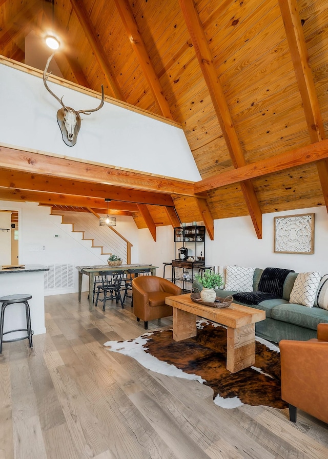825 Hunters Landing Ln, Smithville, TN 37166 - living area with beam ceiling, wooden ceiling, wood finished floors, and stairs