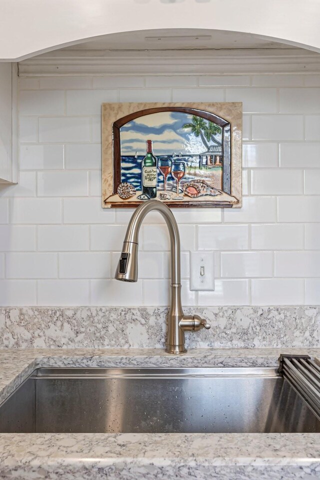 1304 Mallard Dr, Franklin, TN 37064 - details featuring a sink and light stone countertops