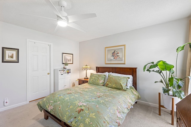 1304 Mallard Dr, Franklin, TN 37064 - bedroom featuring a textured ceiling, baseboards, a ceiling fan, and carpet floors