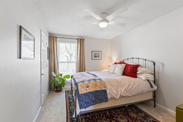 1304 Mallard Dr, Franklin, TN 37064 - bedroom with light carpet, baseboards, a ceiling fan, and a textured ceiling