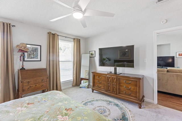 1304 Mallard Dr, Franklin, TN 37064 - bedroom with baseboards, a ceiling fan, carpet, and a textured ceiling