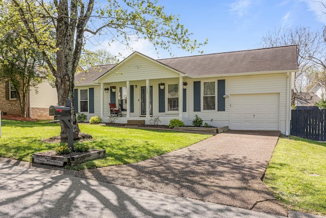 1304 Mallard Dr, Franklin, TN 37064 - ranch-style home featuring a front lawn, fence, covered porch, and driveway