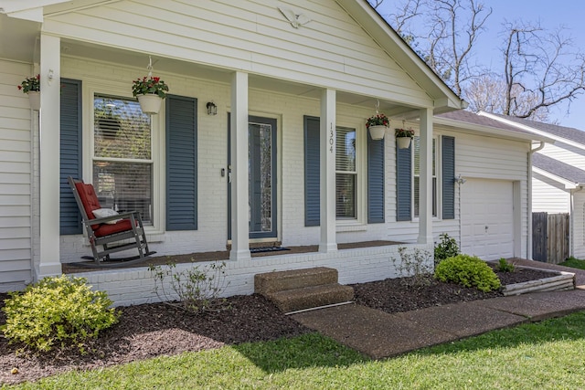 1304 Mallard Dr, Franklin, TN 37064 - entrance to property with brick siding, a porch, and a garage