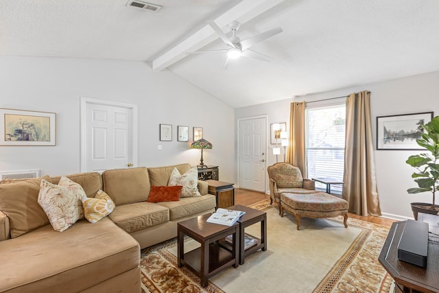 1304 Mallard Dr, Franklin, TN 37064 - living room with ceiling fan, lofted ceiling with beams, light wood-type flooring, visible vents, and baseboards