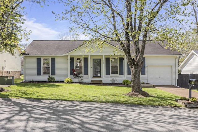 1304 Mallard Dr, Franklin, TN 37064 - single story home featuring driveway, a front yard, a garage, fence, and covered porch