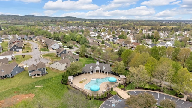 birds eye view of property with a residential view
