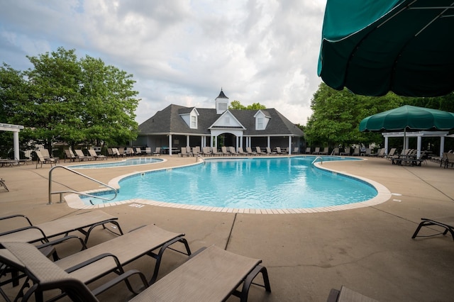 community pool with a patio