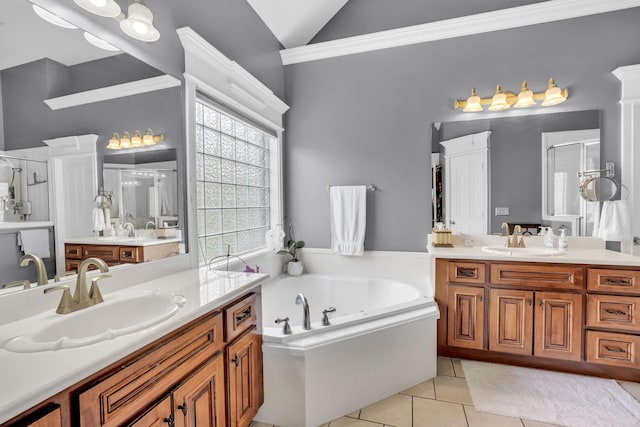 bathroom featuring a sink, tile patterned floors, a shower stall, and lofted ceiling