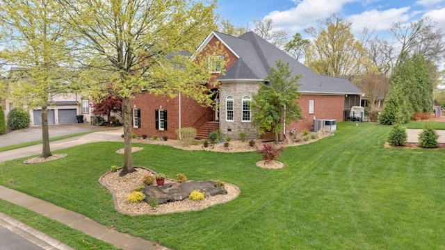 view of home's exterior featuring a yard, stone siding, a garage, and concrete driveway