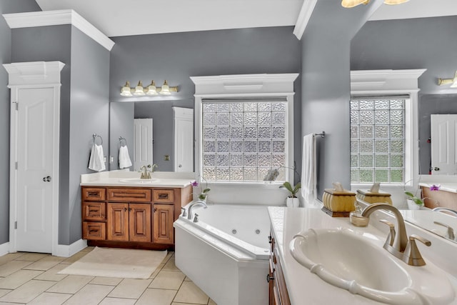 bathroom featuring a whirlpool tub, tile patterned floors, a sink, and two vanities
